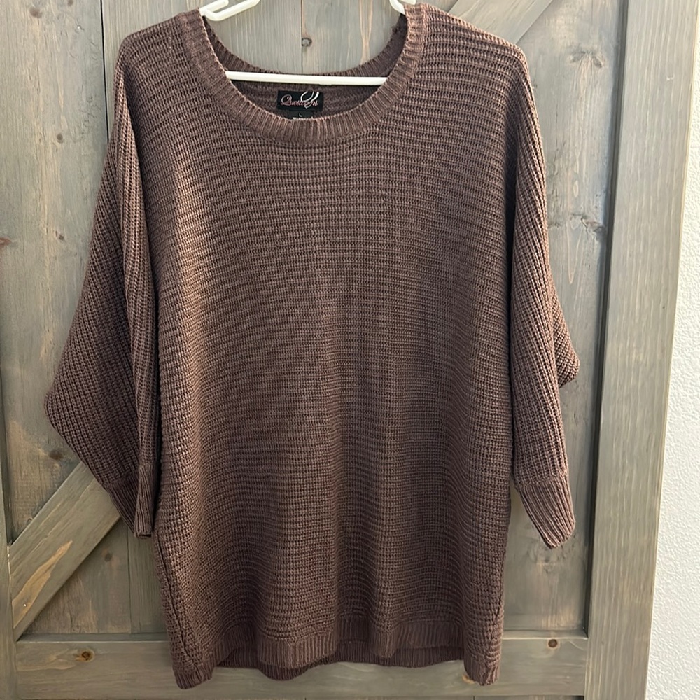 Plum colored crochet sweater top.